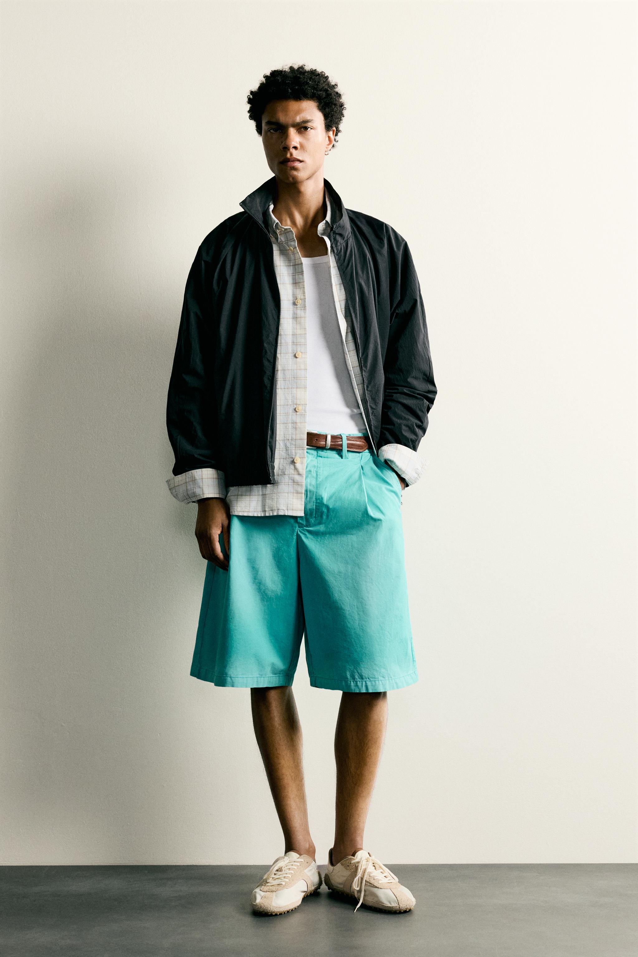 WASHED PLEATED RELAXED FIT SHORTS